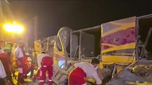  This image taken from a video released by Iranian state television shows the aftermath of a bus crash near Taft, Iran, early Wednesday, August 21, 2024. (Iranian state television via AP)