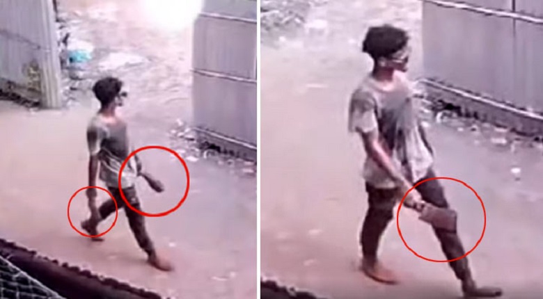 A CCTV footage shows a youth who was carrying a severed hand and a machete. Photo: Collected 