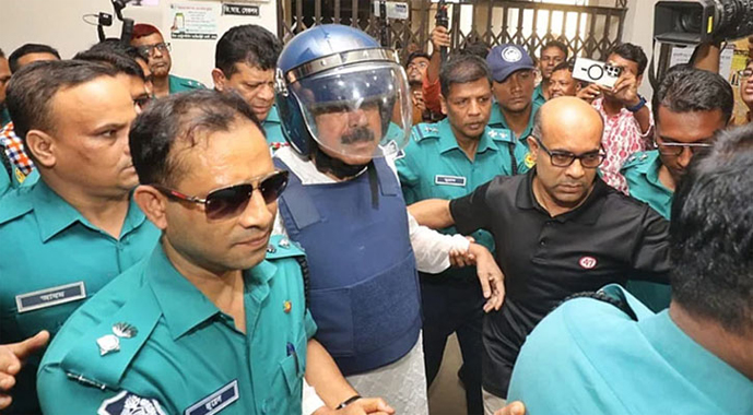 Former shipping minister Shajahan Khan is being taken to Dhaka Metropolitan Magistrate Ali Haider in a murder case Sunday. 