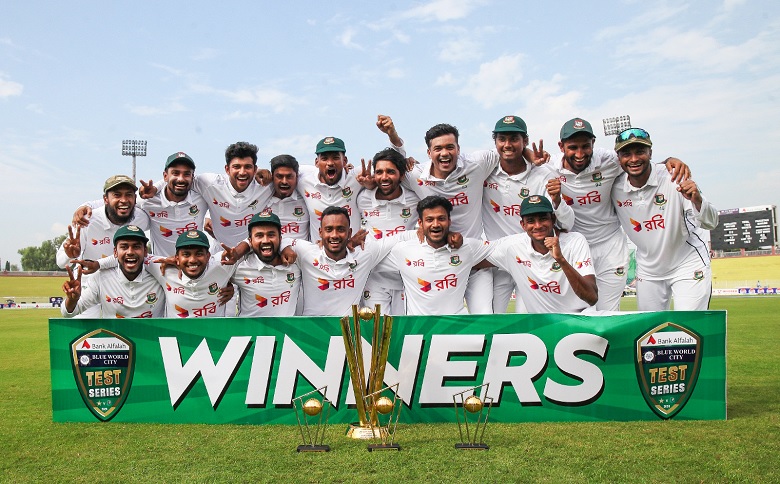 Bangladesh team celebrates with the trophy after securing their first-ever Test series win against Pakistan. Photo: PCB