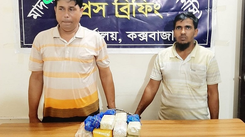 Police constable Jahangir Alam (L) and the autorickshaw driver Shamsul Islam (R). 