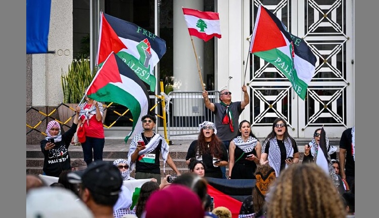 Pro-Palestinian protesters rally in support of Gaza and Lebanon in front of the City Hall to mark one year of the war between Hamas and Israel in Orlanda, Florida, on October 5, 2024.(AFP)