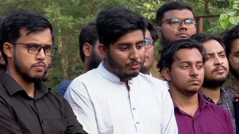 Anti-Discrimination Student Movement's coordinator Rifat Rashid speaks to reporters at Rayer Bazar Graveyard arly Friday (November 15, 2024) afternoon.