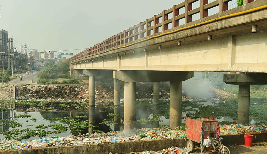 Once-vibrant Marikhali River in Narayanganj's Sonargaon upazila turned into a garbage dump due to encroached upon both banks of the river, constructing buildings and dumping waste. Photo: Observer