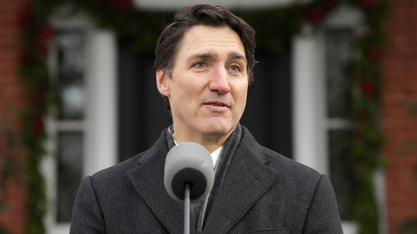 Canadian Prime Minister Justin Trudeau speaks to the press outside Rideau Cottage in Ottawa, Canada, on January 6. Adrian Wyld/The Canadian Press/AP